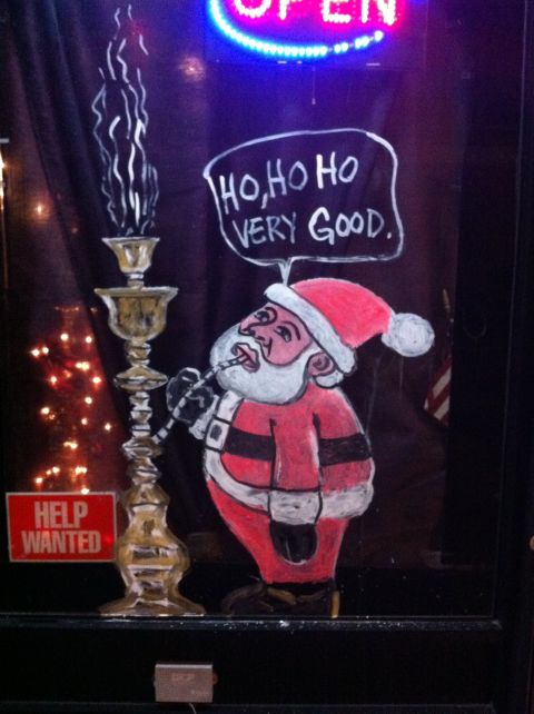 2007 Subaru Impreza - A chalk drawing on a window depicts Santa Claus enjoying a hookah, with a 'Help Wanted' sign visible nearby.