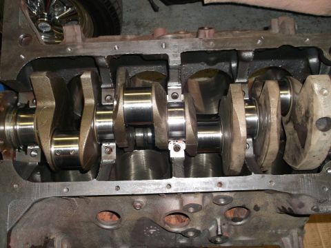 1969 Ford Torino - Close-up view of an engine's crankshaft, showing the main bearings and journals.