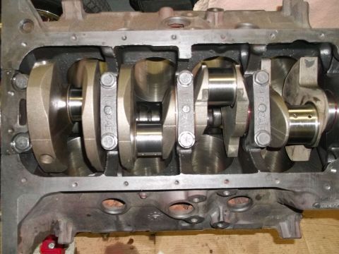 1969 Ford Torino - Close-up view of the internal components of an engine block, showing the crankshaft and connecting rods.