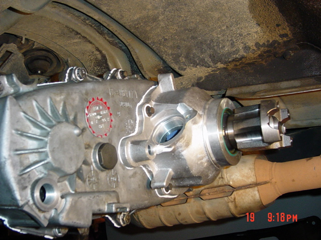 Transfer case with driveshaft attached, viewed from below