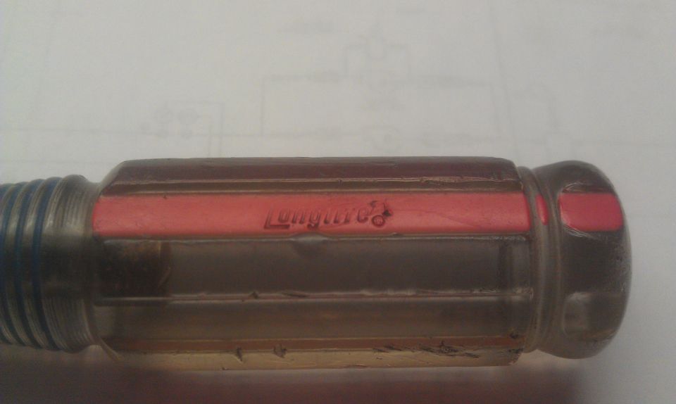 Screwdriver handle with red insert showing "Longlife" text