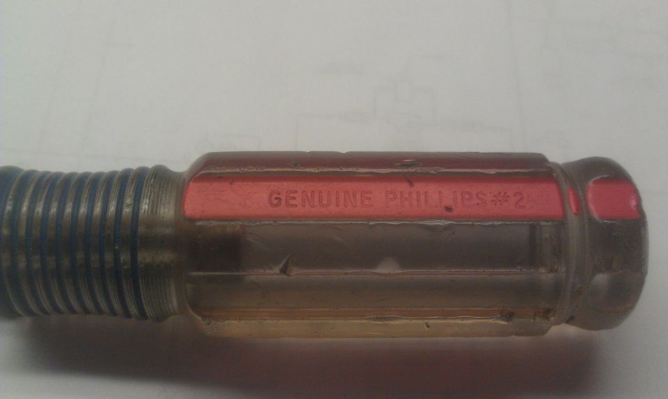 Transparent screwdriver handle with red insert showing 'GENUINE PHILLIPS #2'