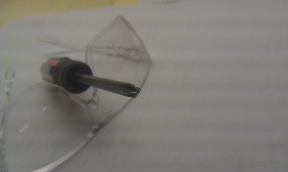 Screwdriver tip on clear plastic with Supermotors.net logo