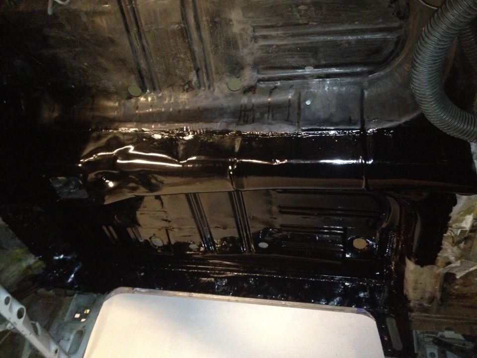 POR15 on floor pan, 65 Mustang.  Pass side done about 3 months ago (faded side).  Both sides painted with semi-gloss.