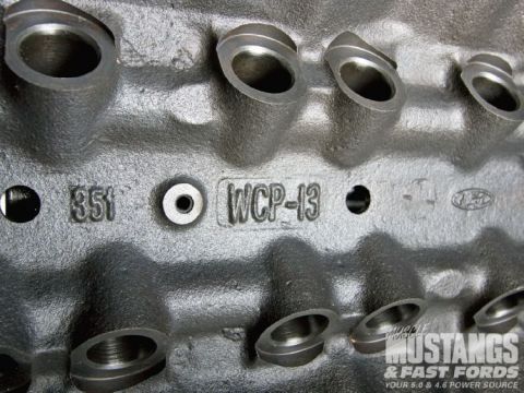 1990 Ford Bronco - Close-up of an engine block casting showing "351" and "WCP-13" identifiers.