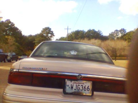 1996 Mercury Grand Marquis - Rear view of a 1996 Mercury Grand Marquis sedan with a Louisiana license plate.