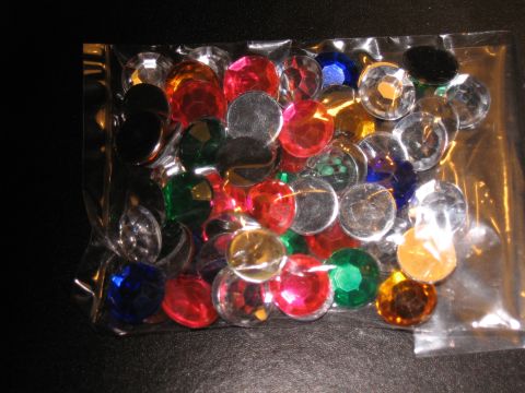 1994 Ford Bronco - A collection of colorful rhinestones are contained within a clear plastic bag.