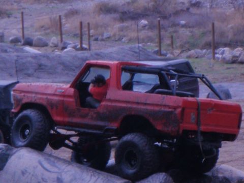 1978 Ford Bronco - This red 1978 Ford Bronco is navigating a rocky obstacle course.