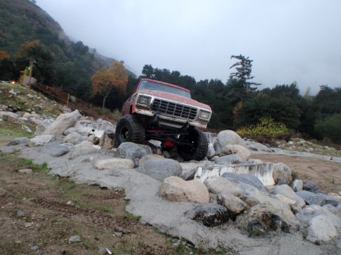 1978 Ford Bronco - This red 1978 Ford Bronco is navigating a rocky obstacle course.