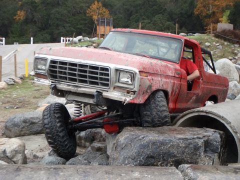 1978 Ford Bronco - Modified 1978 Ford Bronco navigating a rocky obstacle course.