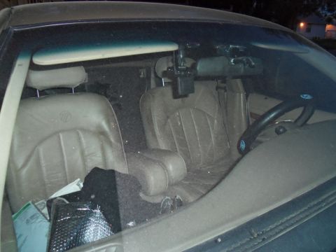 2000 Mercury Grand Marquis - Interior view of a 2000 Mercury Grand Marquis, showing the front seats and steering wheel.