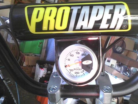 2003 Ford Crown Victoria - ProTaper handlebars mounted with a boost gauge, indicating 10 PSI.