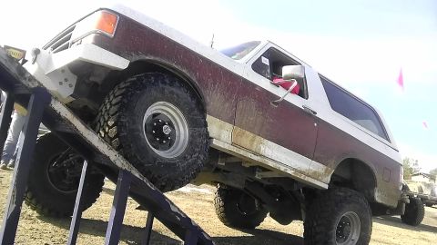 1989 Ford Bronco - This 1989 Ford Bronco is shown navigating an obstacle course, demonstrating its off-road capabilities.