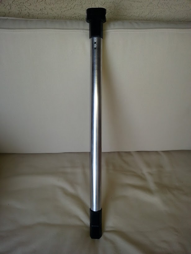 Metal pole with black caps
