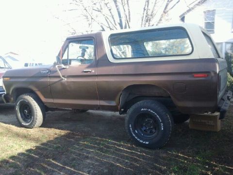 1979 Ford Bronco - This 1979 Ford Bronco is seen from the side, a two-tone brown and white paint scheme.
