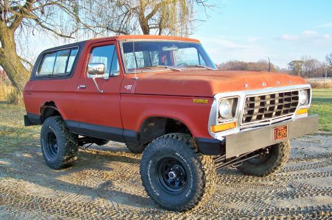 1978 Ford Bronco - This 1978 Ford Bronco features a lifted suspension and a custom front bumper, giving it a appearance.