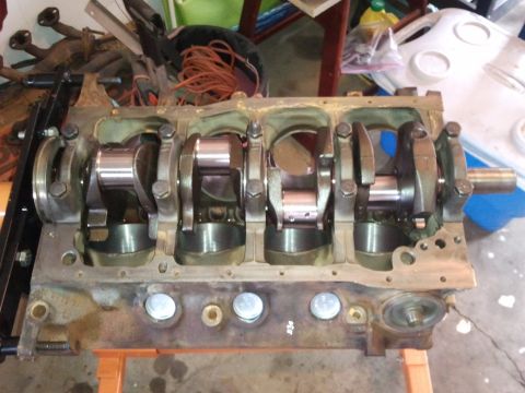 1990 Ford Bronco - Close-up view of an engine block's internal components, including the crankshaft and connecting rods.