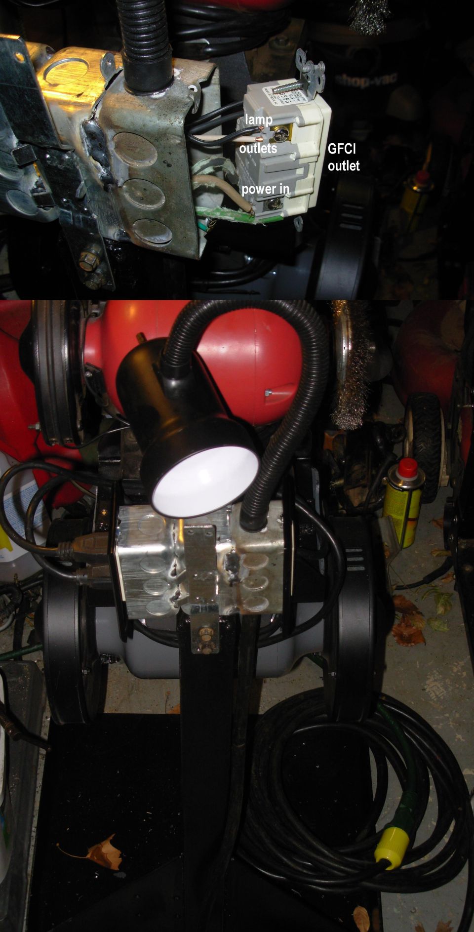 Bench grinder with welded electrical box, GFCI outlet, and gooseneck lamp in a workshop.