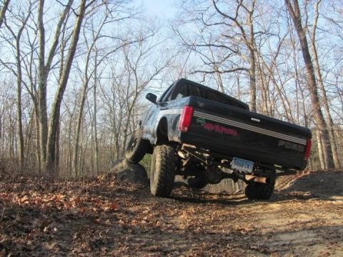 1994 Ford F-150 - This 1994 Ford F-150 is shown navigating an off-road trail during its first wheeling trip.