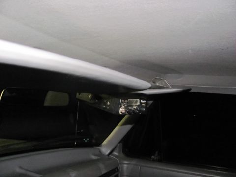 1994 Ford F-150 - The interior of a 1994 Ford F-150 shows a storage visor installed above the windshield.