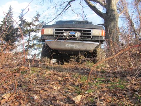 1994 Ford F-150 - Lifted 1987-1991 Ford F-150 front end seen off-road.