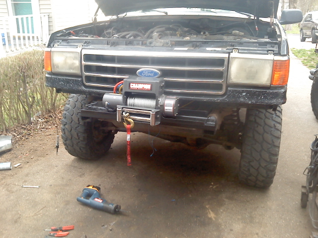 1994 Ford F-150 front view with aftermarket winch mounted on bumper
