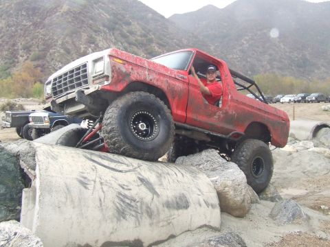 1978 Ford Bronco - This modified 1978 Ford Bronco navigates a challenging rocky terrain, its off-road capabilities.