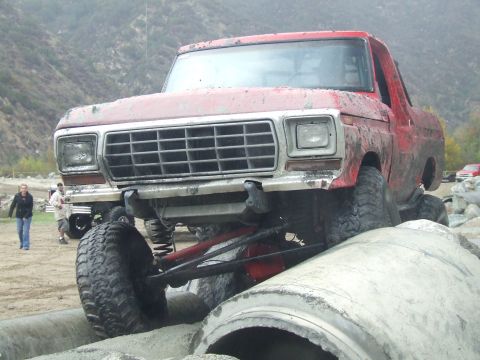 1978 Ford Bronco - This modified 1978 Ford Bronco is navigating a challenging off-road obstacle course.