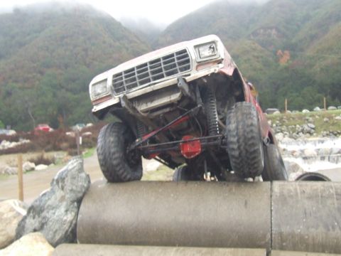 1978 Ford Bronco - This 1978 Ford Bronco is navigating an obstacle course with its front end lifted high.