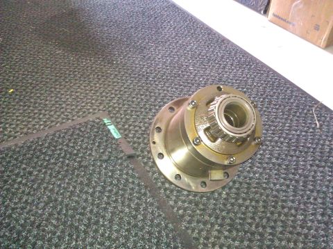 1995 Ford Bronco - Differential carrier assembly with bearing, likely from a vehicle's drivetrain.