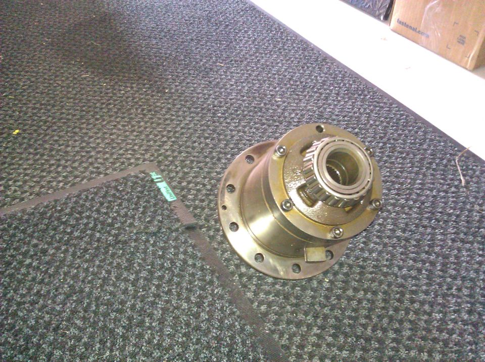 Differential carrier with bearing assembly on carpeted surface