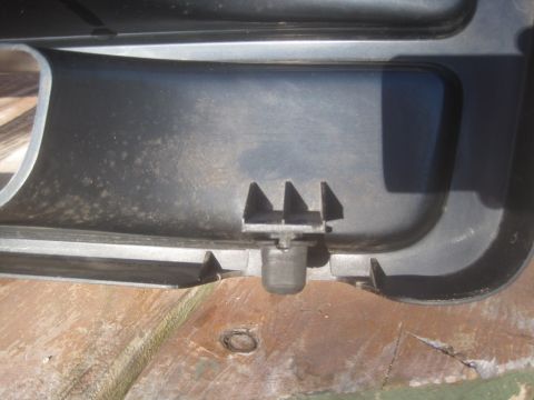 1993 Ford Bronco - Plastic trim piece with clips, likely from a vehicle's interior or exterior trim.