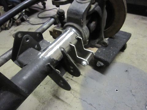 2008 Jeep Wrangler - This photo shows a custom-fabricated axle housing with suspension mounting points, not a complete vehicle.