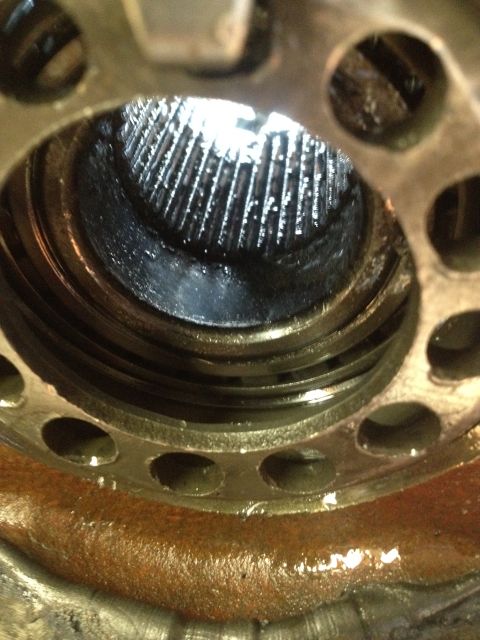 1979 Ford Bronco - This image shows the worn internal gears of a transmission, covered in grease and grime.