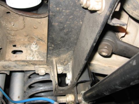 1995 Ford Bronco - looking up at the bolts for the upper trackbar to frame mount.