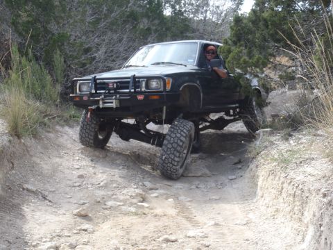 1979 Ford Bronco - This lifted pickup truck is equipped for off-road adventures on a rocky trail.