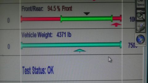 2000 Mercury Grand Marquis - A digital readout displays vehicle weight and alignment test results.
