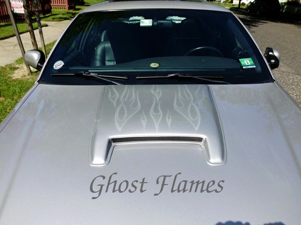 Silver sedan hood with scoop, ghost flame graphics and 'Ghost Flames' script