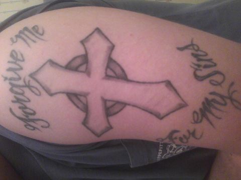 2003 Ford Crown Victoria - A tattoo depicts a cross with the phrase 'Forgive me for all my sins' written around it.