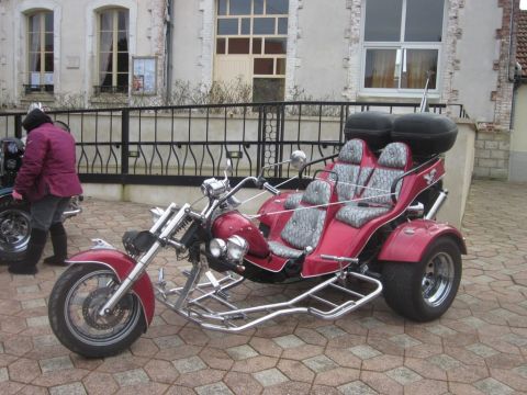 1991 Ford LTD Crown Victoria - This custom trike has a motorcycle front and a car-like rear with seating for four.