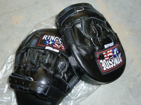 1992 Ford Mustang - Two black leather boxing mitts, branded Ringside USA, are shown in this image.