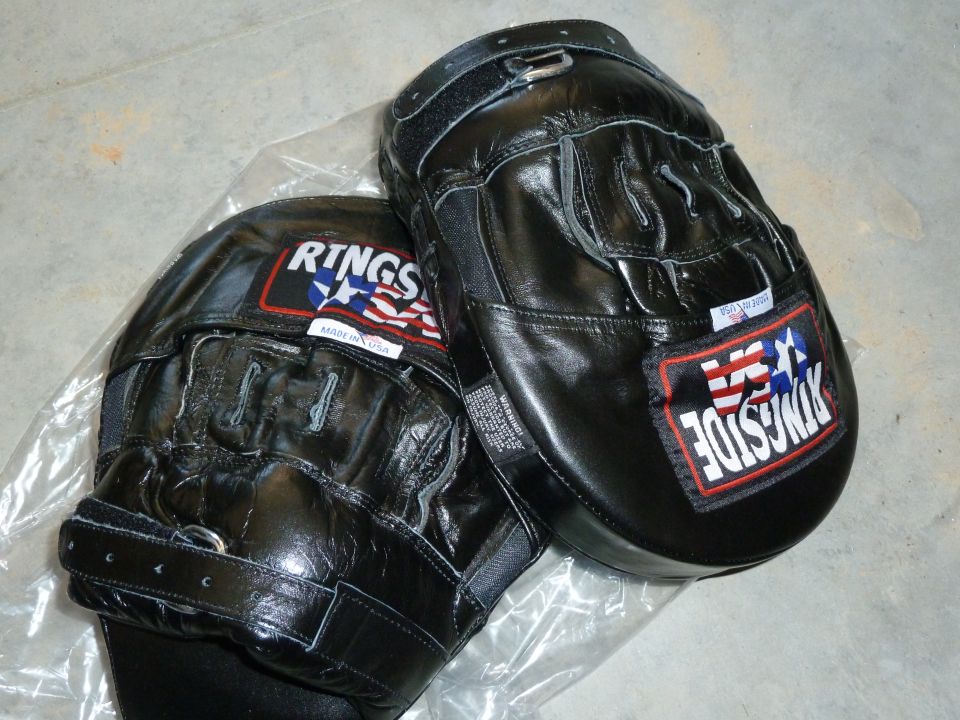 Pair of black boxing mitts with Ringside USA logos