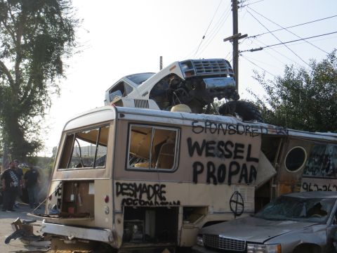 1978 Ford Bronco - A scene of destruction with multiple vehicles in disarray, including a van and a truck.