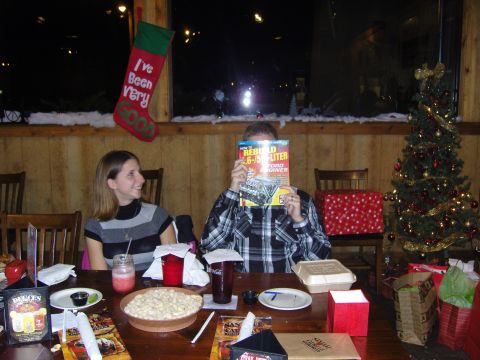 2007 Ford Mustang - A holiday gathering with food, drinks, and festive decorations is underway.