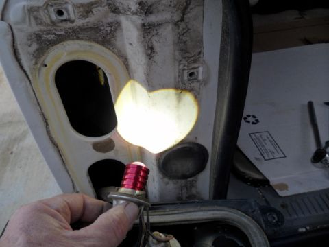 1994 Jeep Cherokee - Replacing a taillight bulb with an LED in a vehicle's housing.