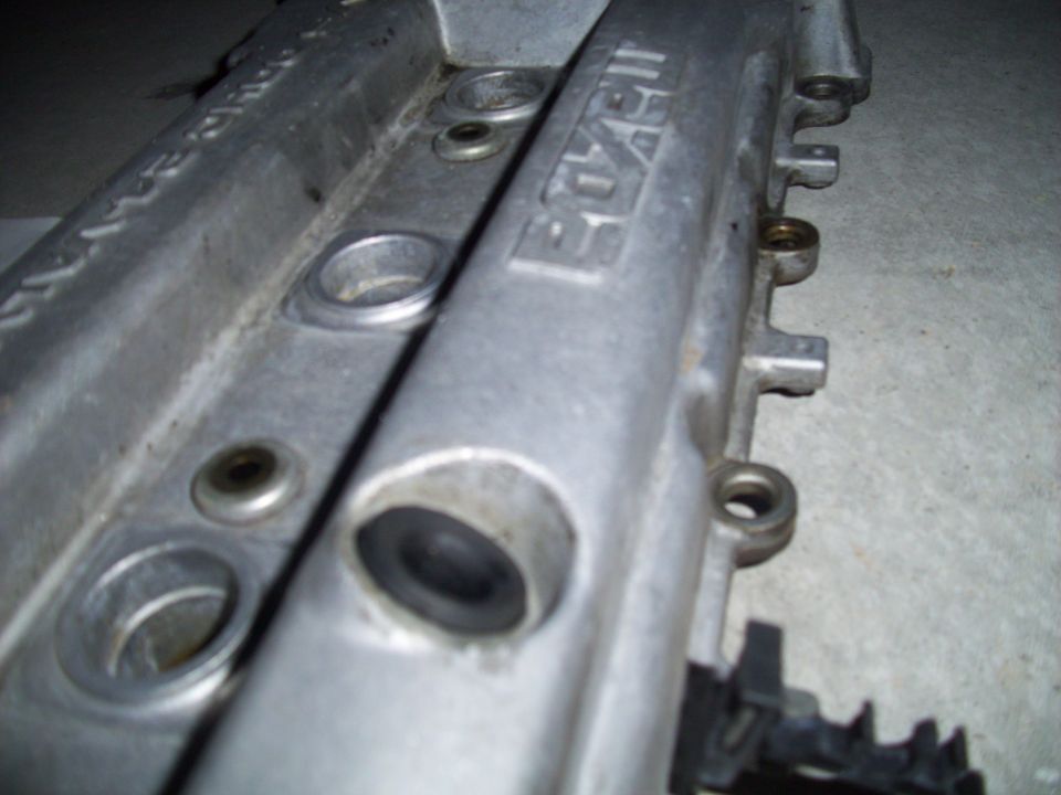 Mazda engine valve cover with visible text