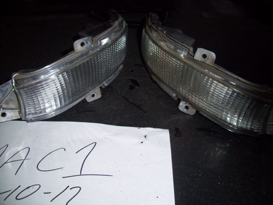 Pair of clear corner marker lights with mounting holes