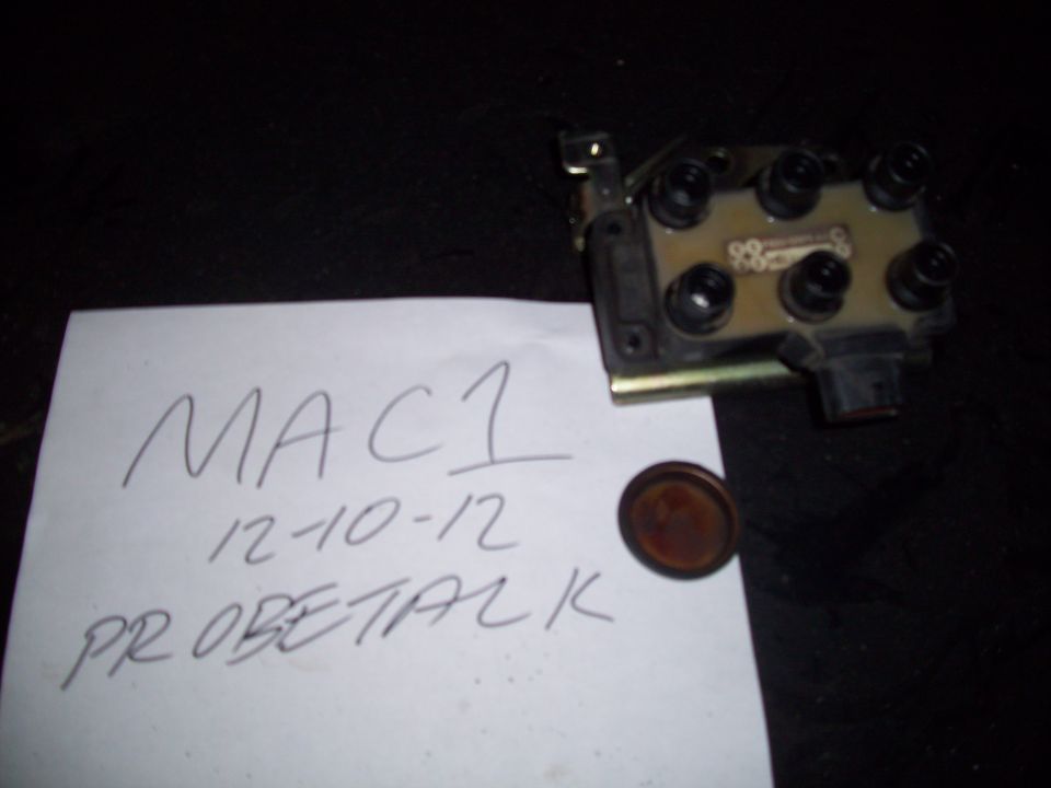 Ignition coil pack with handwritten note that says MAC1, 12-10-12, PROBETALK