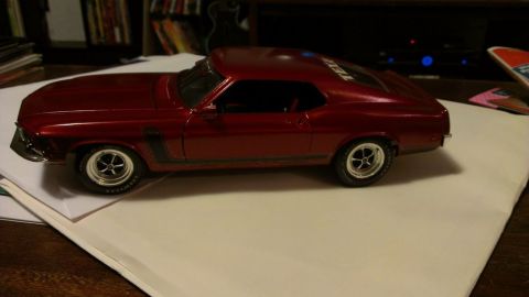 1970 Ford Mustang - a 1:18 model rebuilt in the same color. the light is off, but the car looks good. Couldn't remove the graphic from the rear window. That wi…