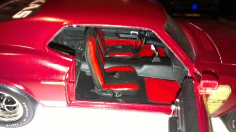 1970 Ford Mustang - similar to what I want to do with the interior. 71 black and red buckets with 71 built in rubber floor mats. Red headliner and A pillar.
